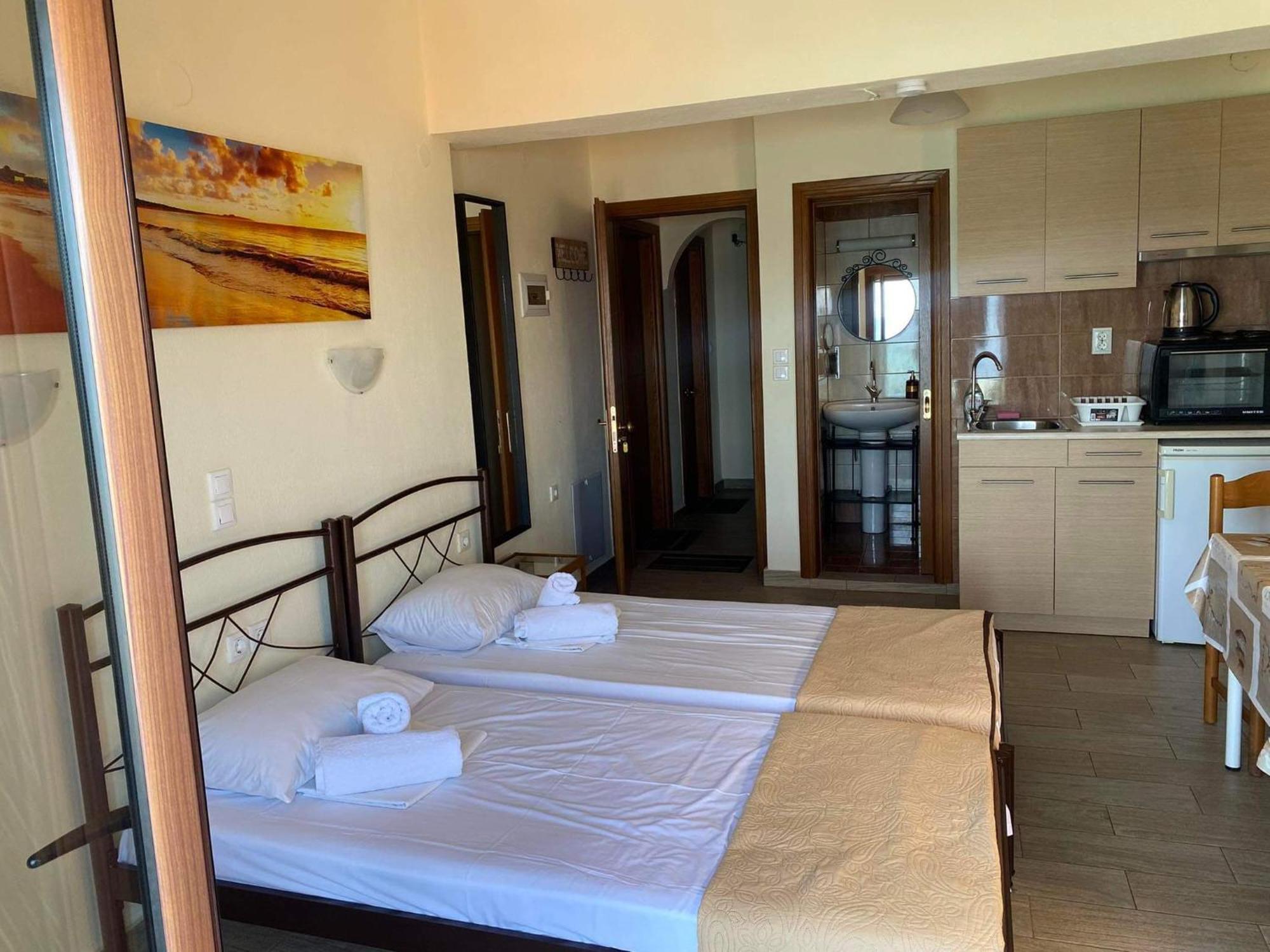 Diolkos Apartement Nea Roda Pokoj fotografie